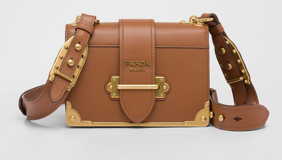 prada cahier leather bag cognac brown color with metal lettering logo on the strap